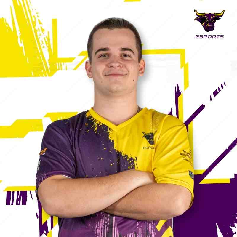 Ethan wearing gold and purple jersey 