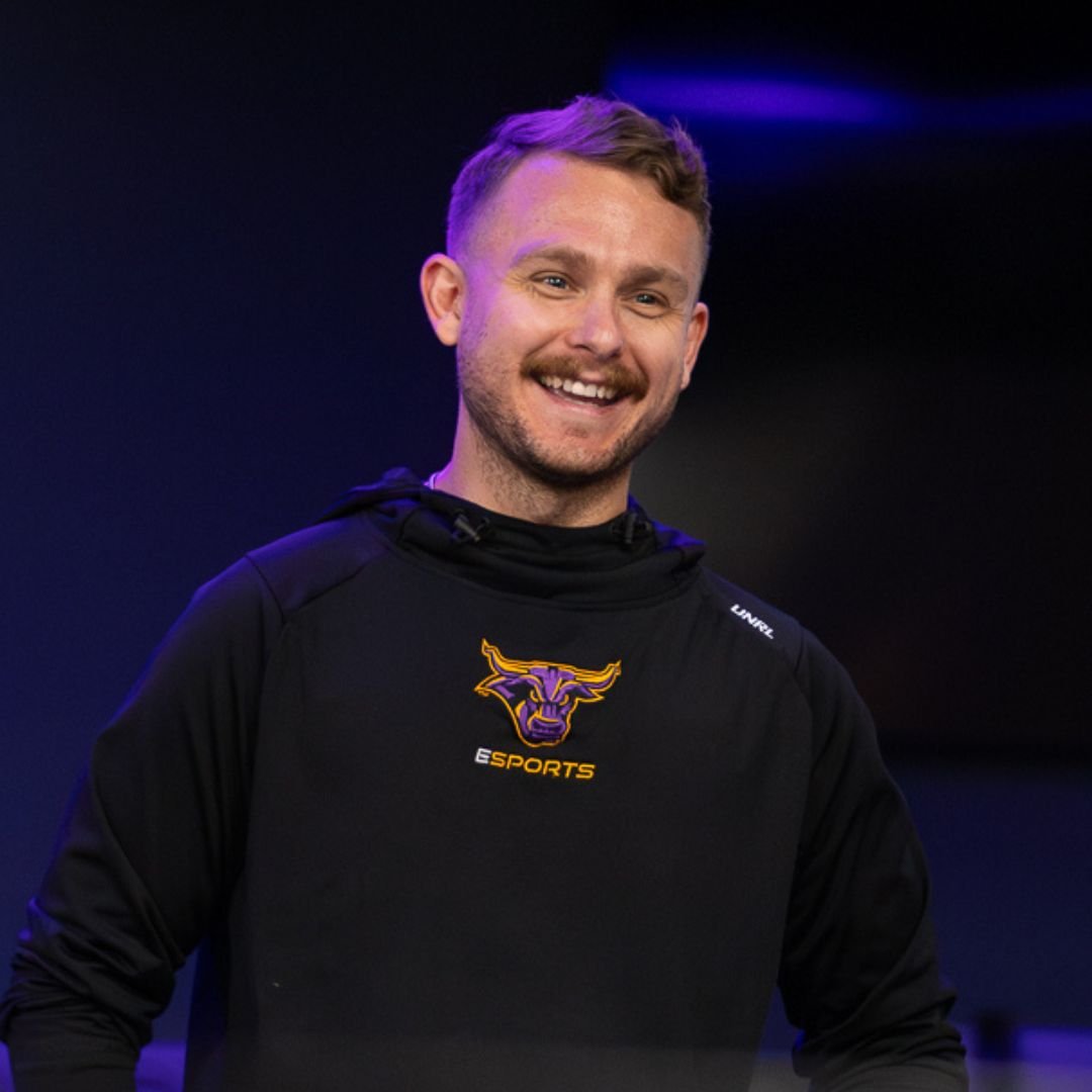 Levi Arnett smiling and wearing a black hoodie with a Maverick Esports logo