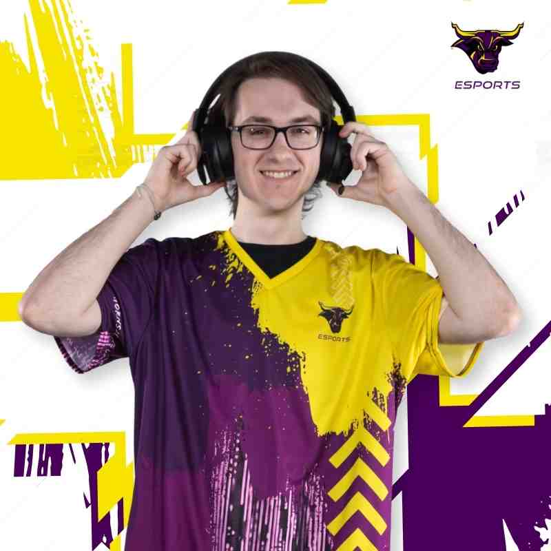 Logan wearing headphones with gold and purple jersey.
