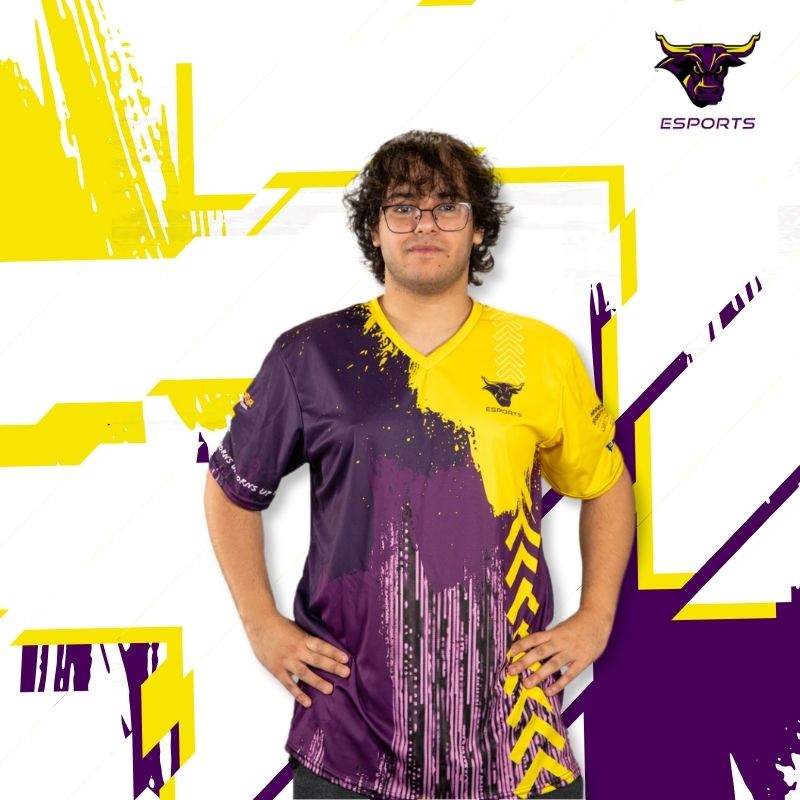 Mahmood Eid varisty Player wearing yellow and purple jersey