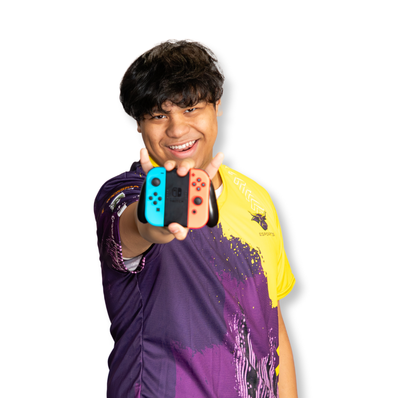 Student wearing gold and purple jersey holding a Nintando switch